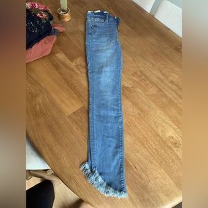 Good American high rise raw hem jeans